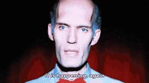 Animation of a man speaking with "It is happening, again" shown as a subtitle.